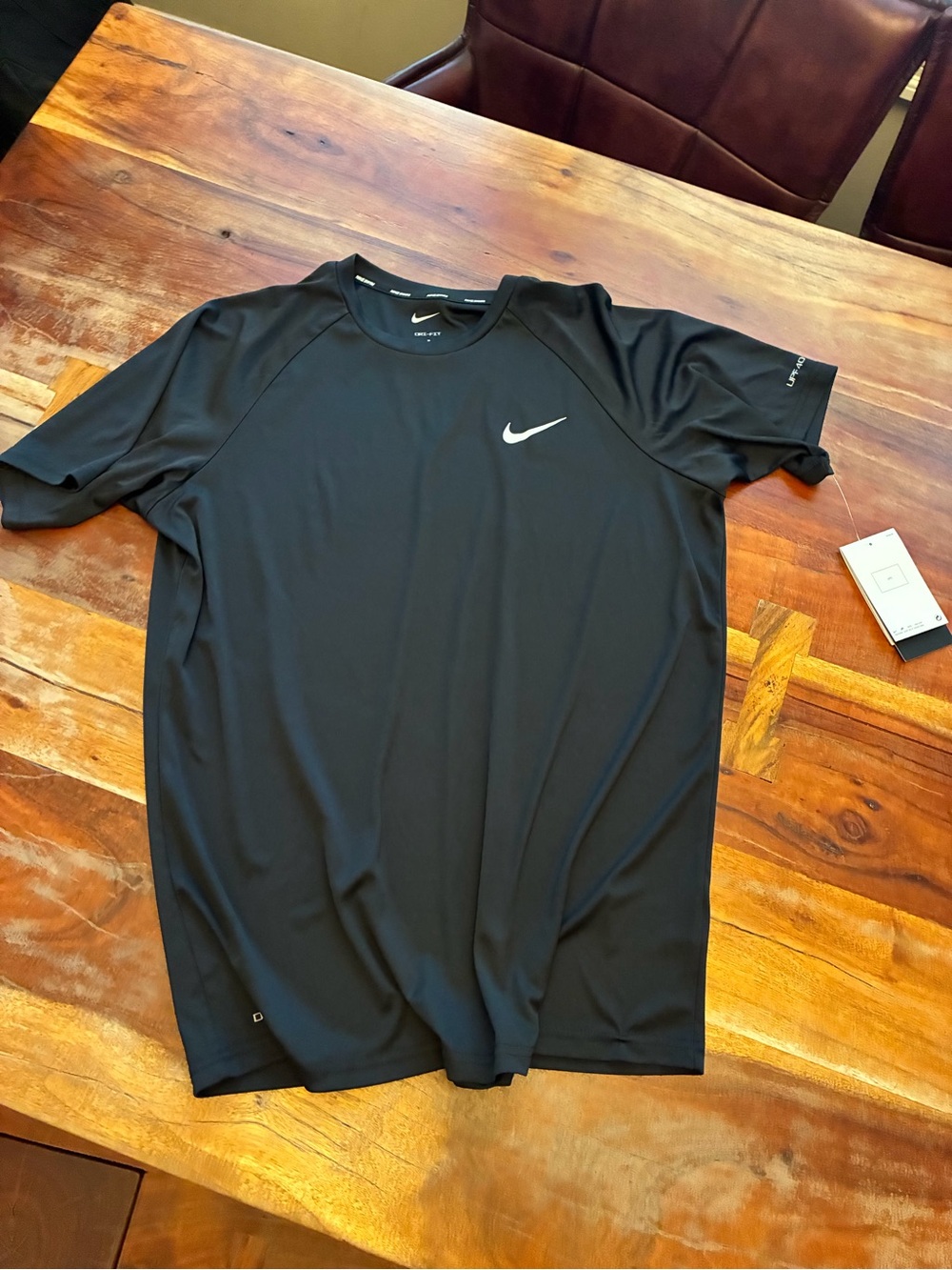 Nike Black Short-Sleeve Athletic Tee with White Swoosh